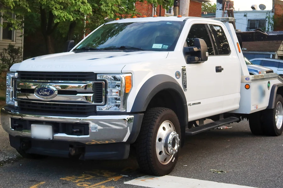 White Ford F-550 Super Duty wrecker tow truck